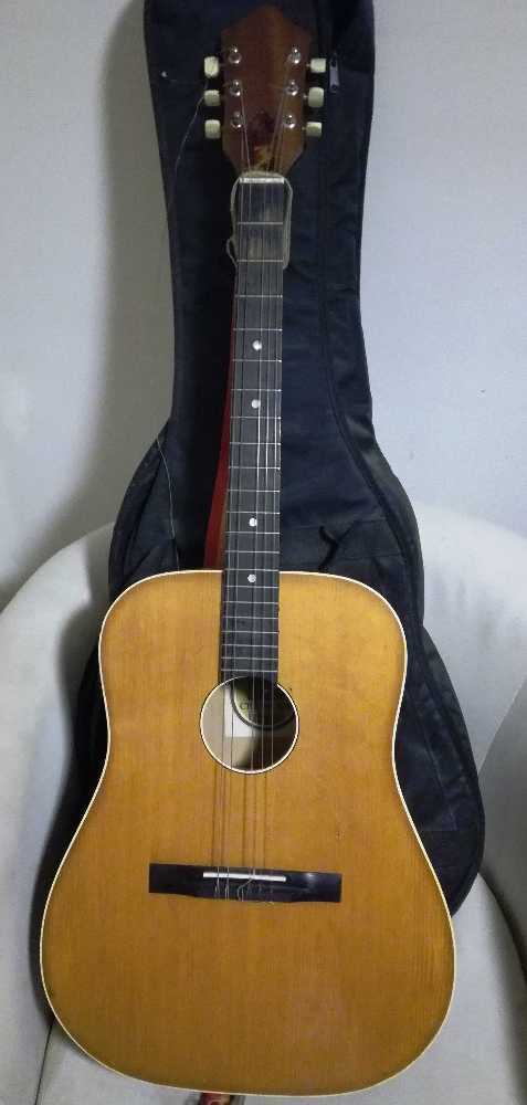 Acoustic guitar with case in london