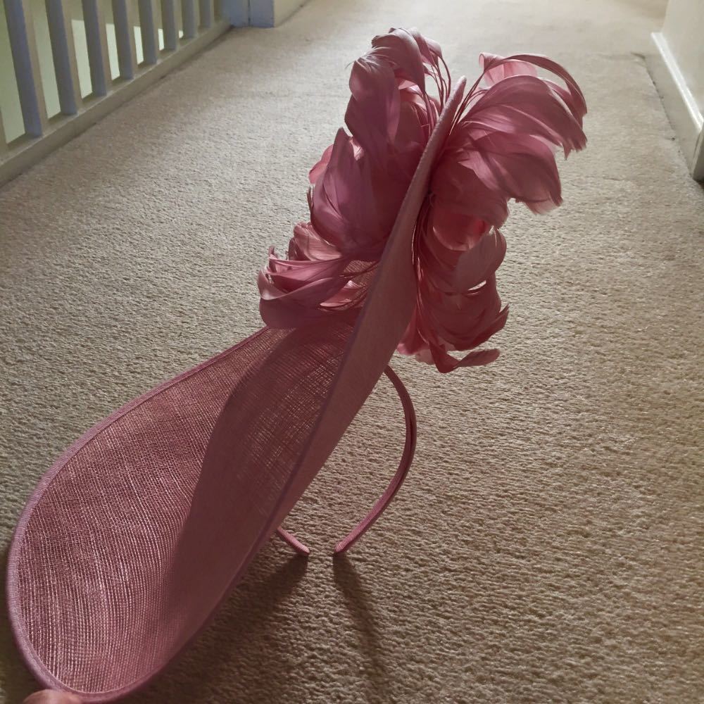 Large pink hat in london