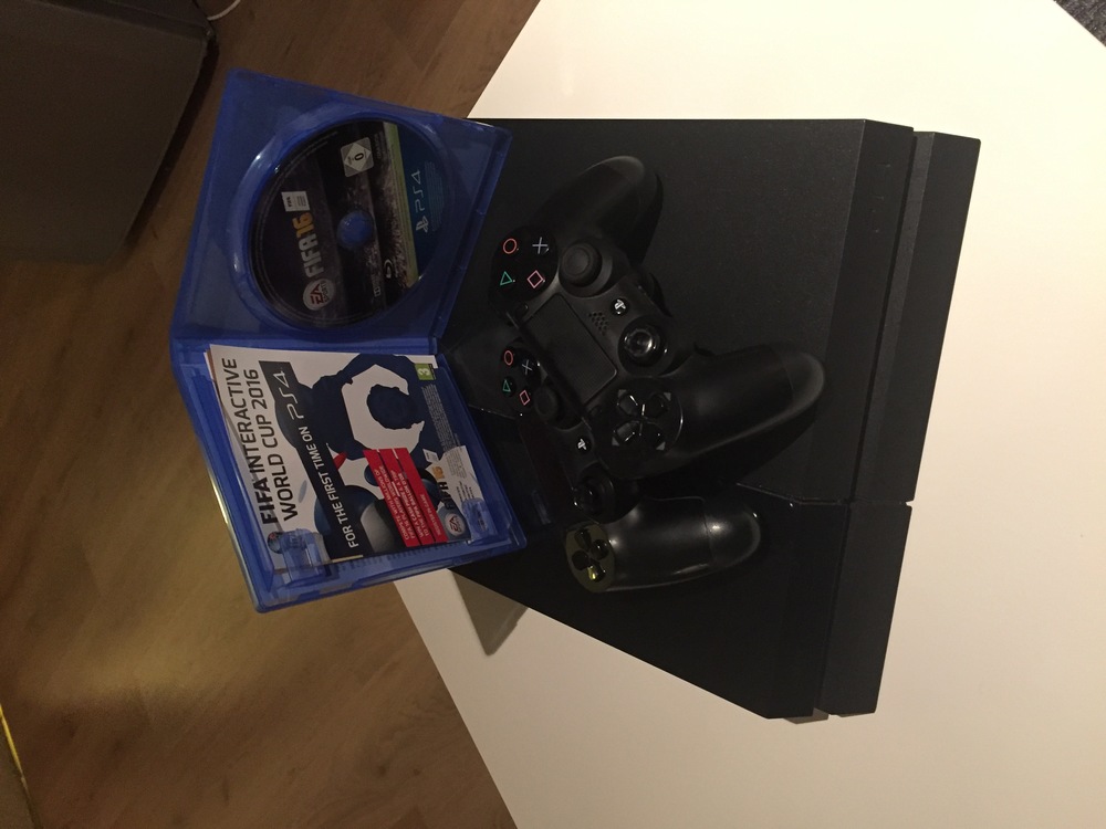 PlayStation 4 w/ FIFA 16 in london